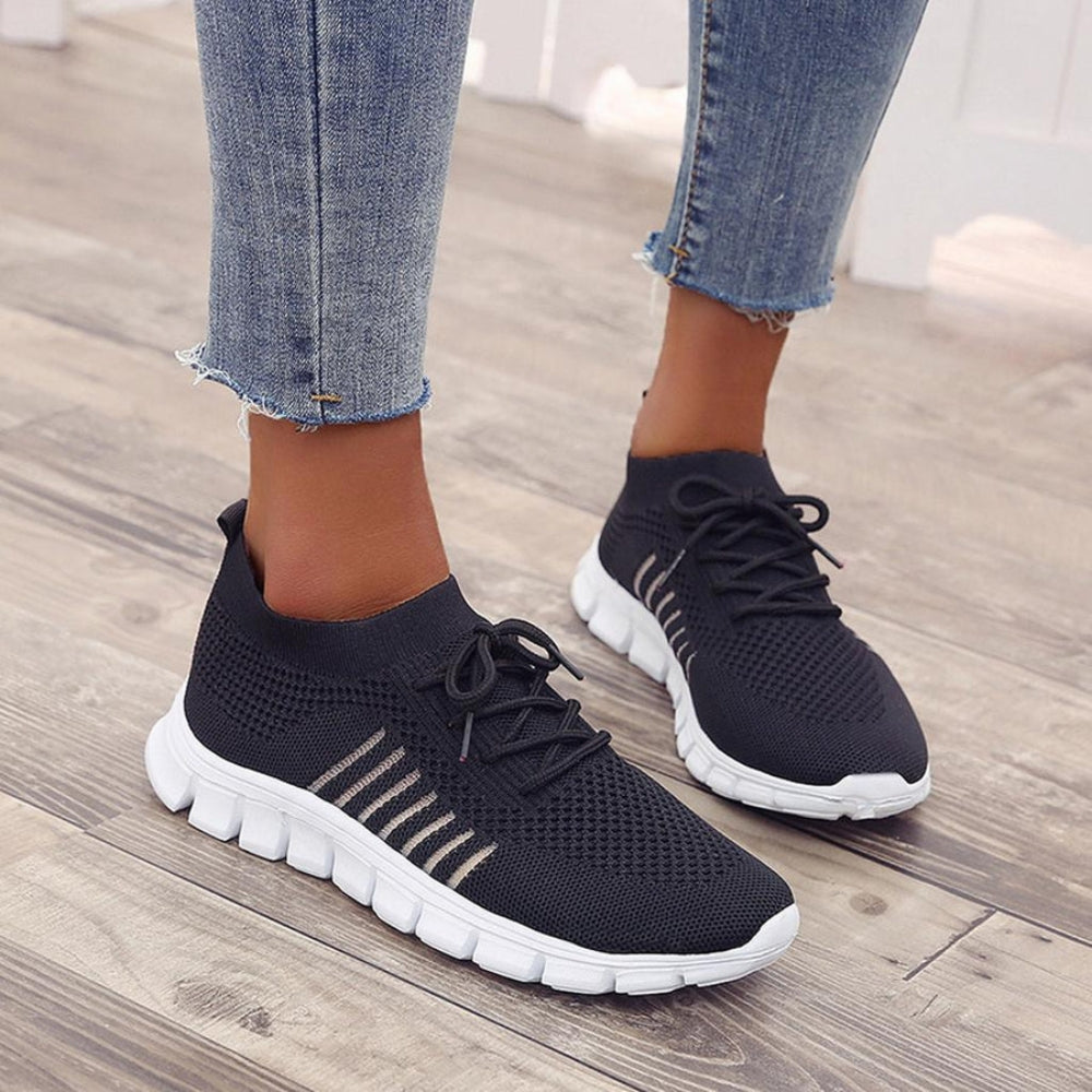 Chaussures de sport noires Monreux Elise – style classique avec détails blancs