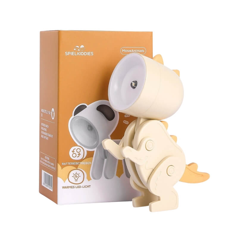 Lampe LED dinosaure marron avec queue orange, lumière chaude douce, présentée debout devant l'emballage Spielkiddies.