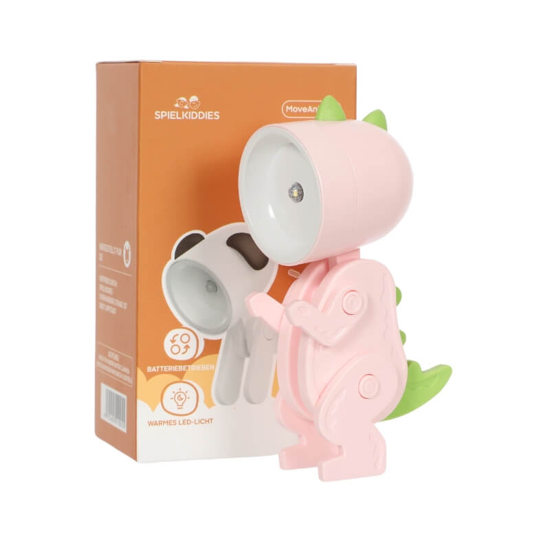Lampe LED dinosaure rose avec détails verts, éclairage doux, jouet de lecture pour enfants devant son emballage.