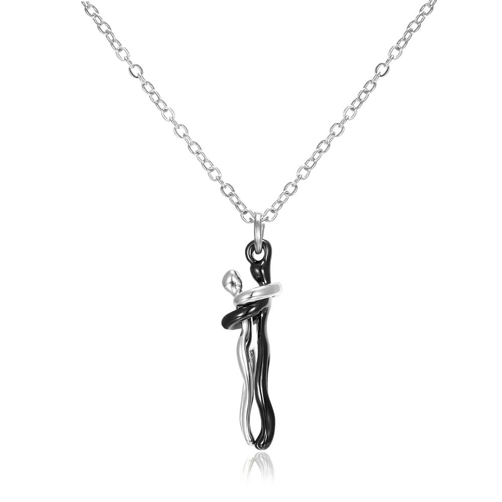 Collier pendentif étreinte noir et argent – Bijou symbolique en acier inoxydable pour couples