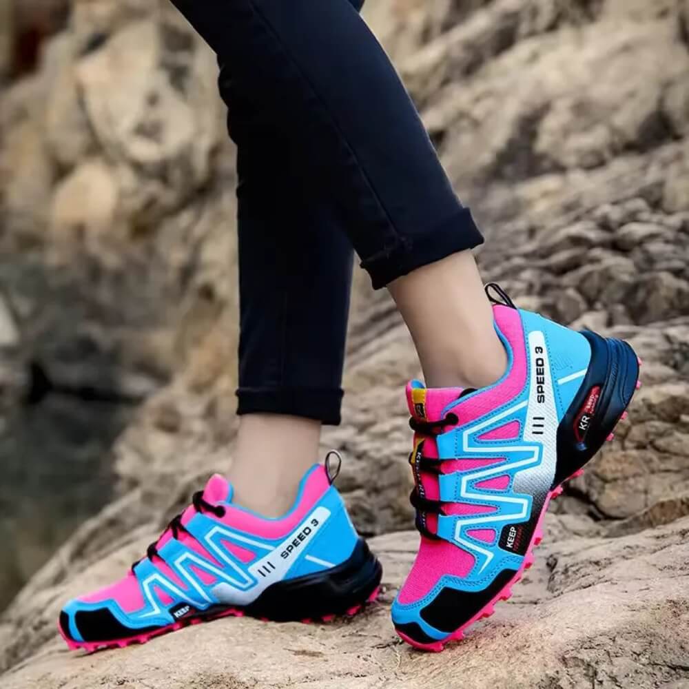 Chaussures de sport femme Monreux OrthoTrek bleu-rose, idéales pour randonnée et course nature.