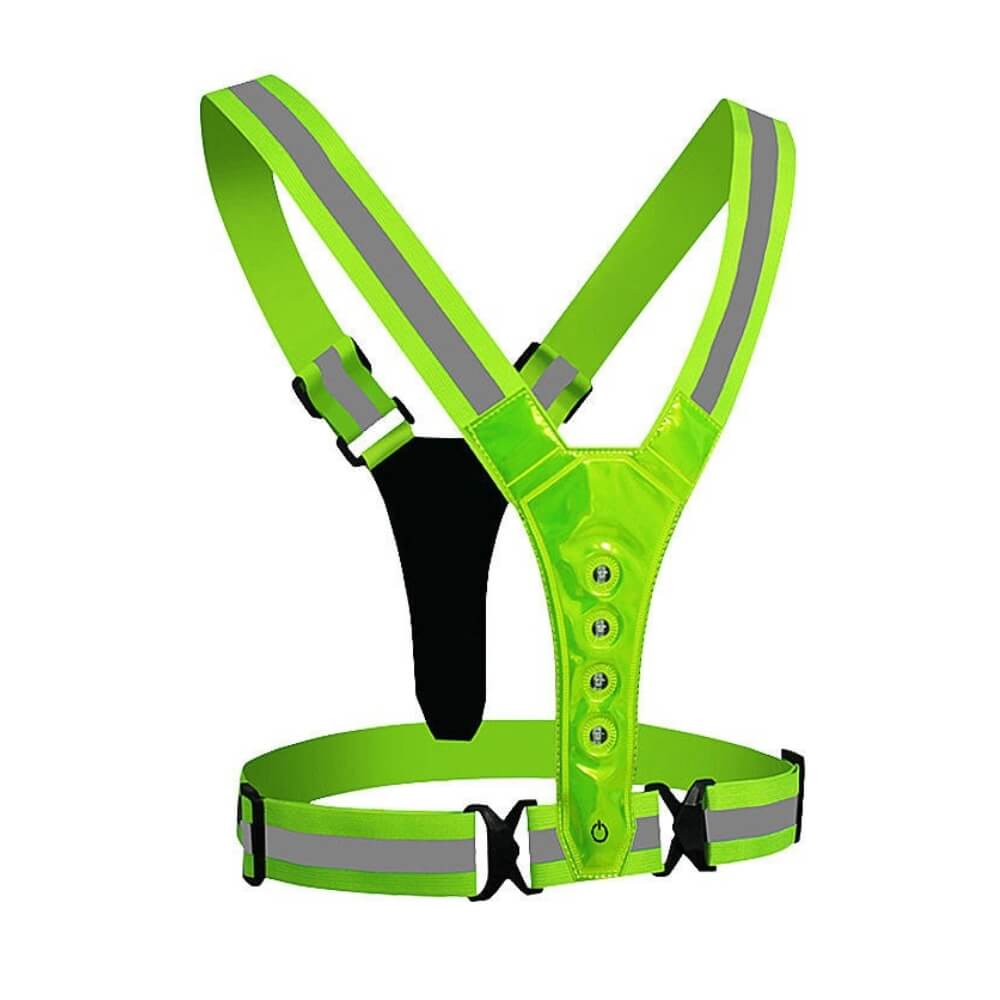 Harnais de sécurité LED vert fluo avec bandes réfléchissantes haute visibilité et bouton marche/arrêt.